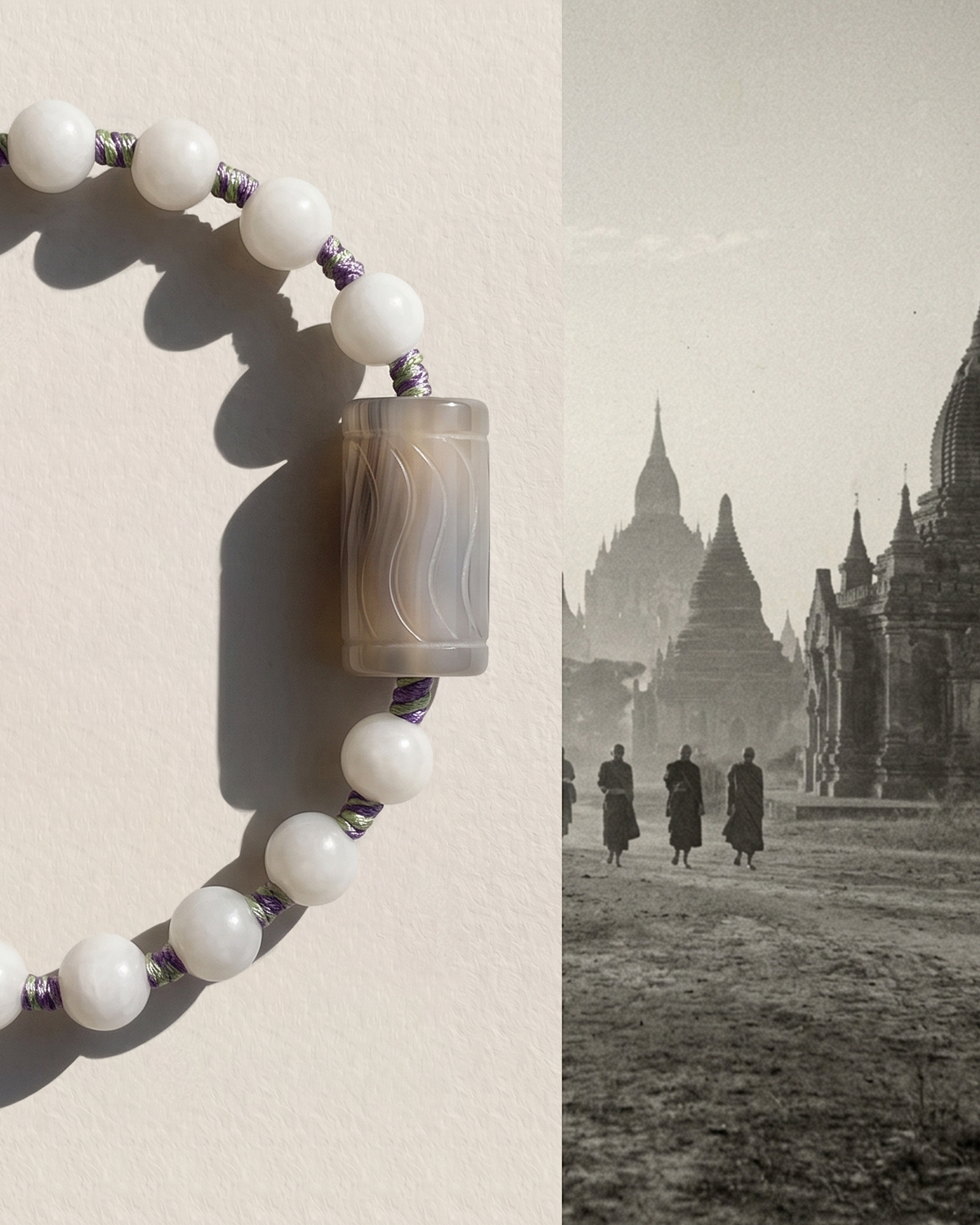 White bead bracelet with a carved grey cylinder bead beside a black-and-white photo of monks near temples.